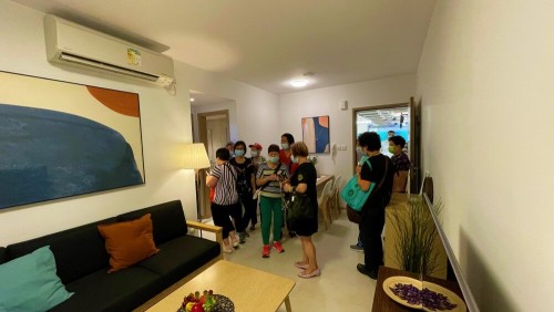 Iao Hon Estate property owners visit temporary housing show flats.