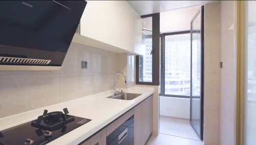 A balcony in the living room area and one in the kitchen for natural light.